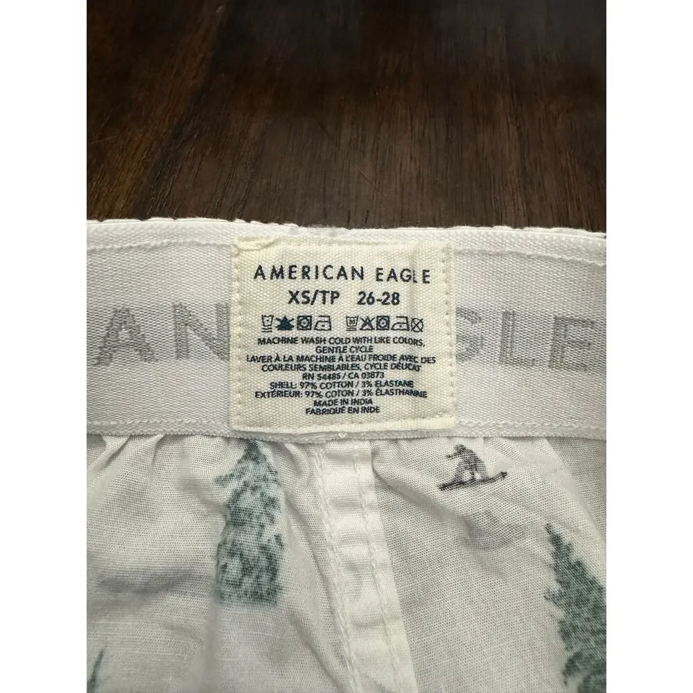 American Eagle white boxer shorts with green pine trees black skiers XS 26-28